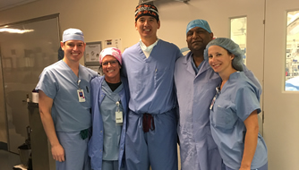 Dr. Sah with member of the OR team